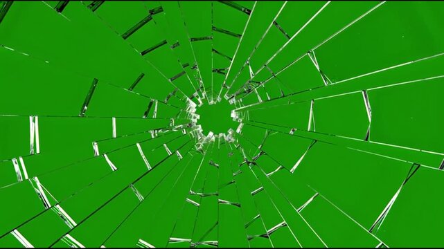 Glass pane shattering with radial cracks on green screen