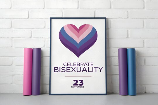 Framed poster featuring a vibrant heart illustration with colorful stripes representing the bisexual pride flag alongside the text celebrate bisexuality for the annual awareness day held on twenty thi