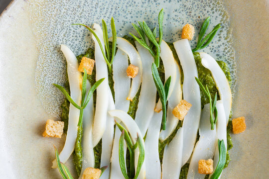 Plated dish with white endive and greens