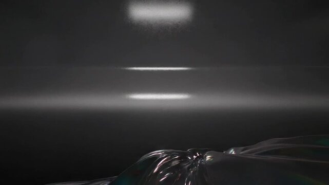 Reacting to backlight metallic fluid forming peaks, folding into ridges in dark box catching light