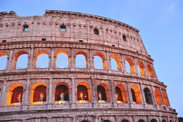 Obraz premium Close Up View of the Illuminated Colosseum at Blue Hour in Rome Italy