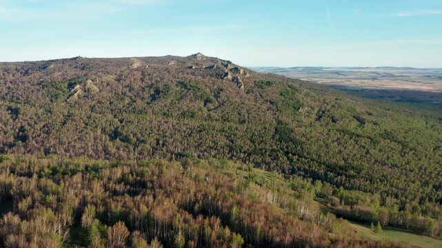 Urals in spring: Irendyk ridge, Ulu-Sykty mountain. Aerial view.