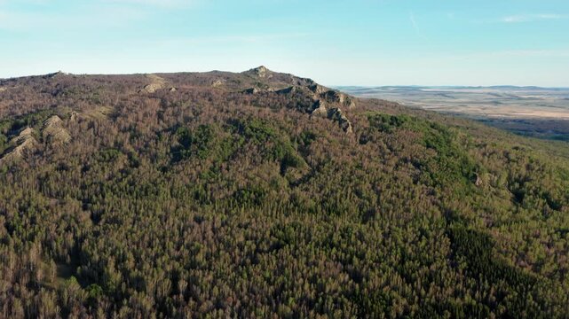 Urals in spring: Irendyk ridge, Ulu-Sykty mountain. Aerial view.