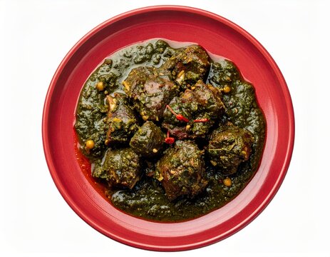 Koppal Mutton Banni Green Roast On Crimson Brick Red Plate Isolated On White Background