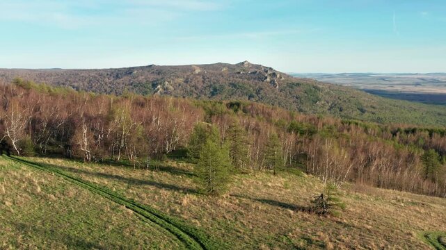 Urals in spring: Irendyk ridge, Ulu-Sykty mountain. Aerial view.