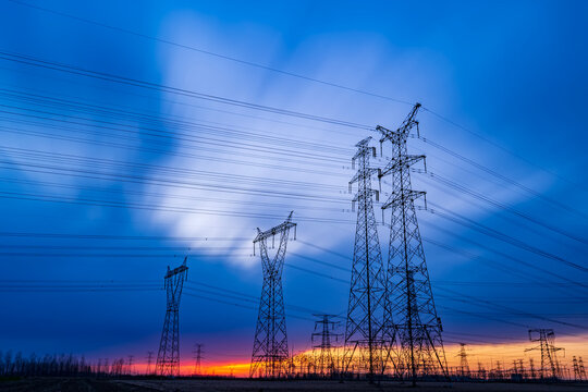 The pylons are in the evening, Substation in the evening, High voltage substation and beautiful sunset glow