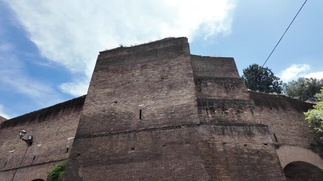 Majestic historic medieval brick tower house in scenic Italian town