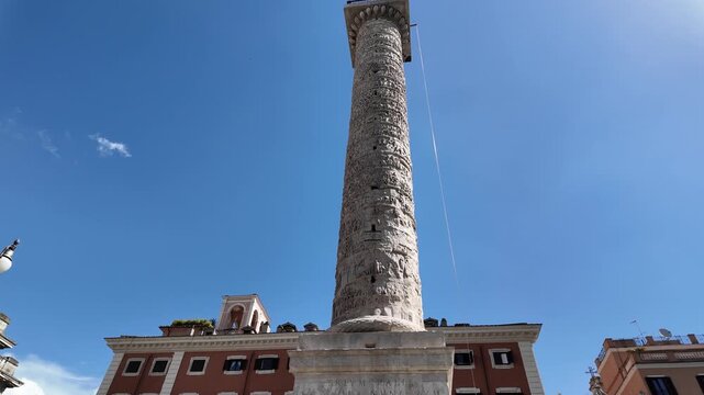 View of the historic Column of Marcus Aurelius in Piazza Colonna Rome Italy