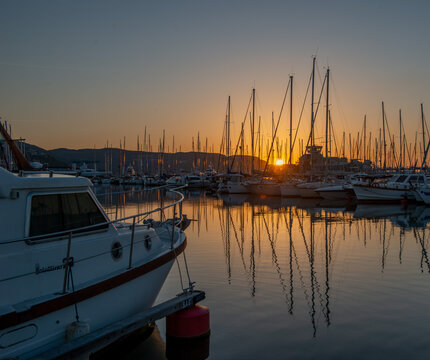 Golden dawn over the Loano marina