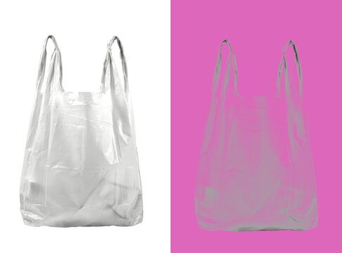 Single empty plastic grocery bag with handles, captured on white and dark backgrounds to emphasize the translucent and crinkled isolated on a transparent background