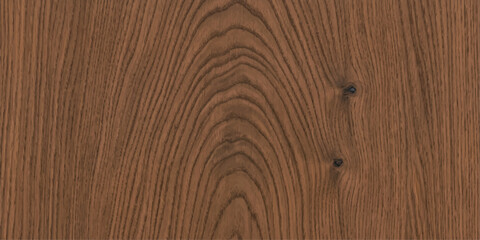 A close-up macro shot showcases the natural wood grain pattern of a warm, brown hardwood surface, highlighting its organic texture and imperfections. © QUALITY BOOST