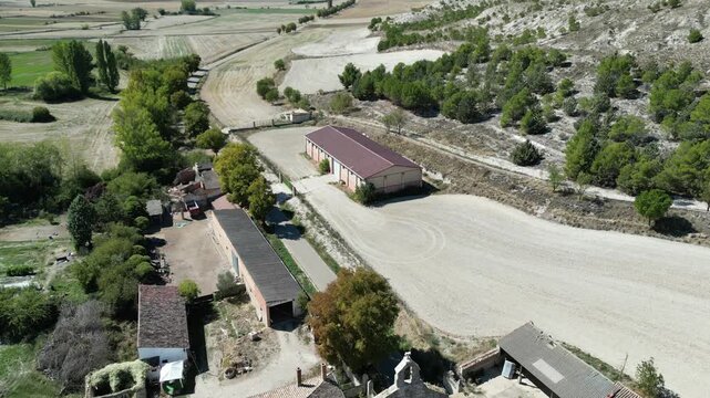 A drone shot of San Anton ruins and rural village landscape along Camino de Santiago in Spain