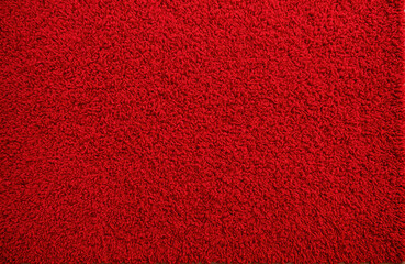 Fototapeta premium Vibrant Red Shaggy Carpet Texture for Modern Interior Home Design Background