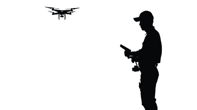 Photographer wearing a cap pilots a quadcopter drone to capture aerial images from a remote handheld device.