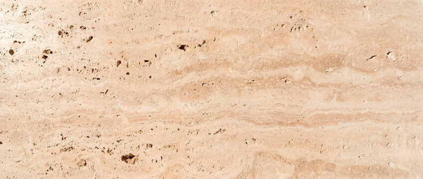 Natural beige travertine stone texture background with organic marble veining