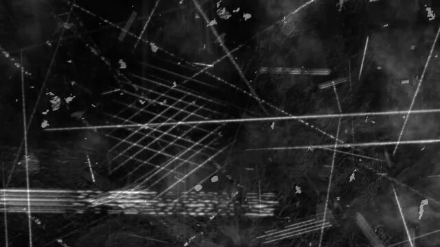 Abstract grunge texture background with white scratches lines and dust particles on black surface old film overlay effect for video