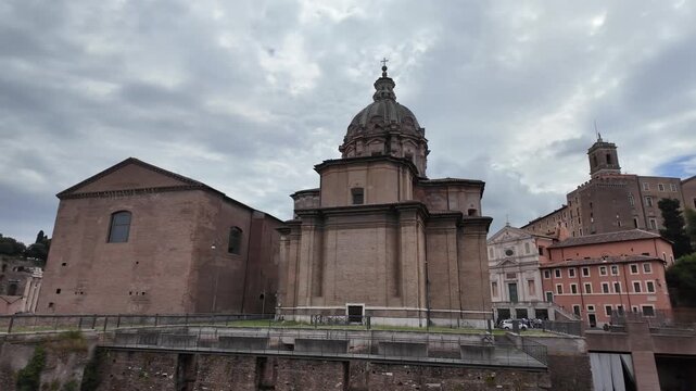 Majestic baroque exterior facade of Santi Luca e Martina church in Rome