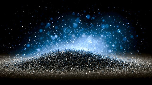 Silver blue glitter flakes floating black background