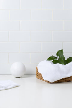 Minimalist organic skincare mockup scene in bright bathroom interior. Clean aesthetic template with copy space for wellness, beauty products, or body care brands.