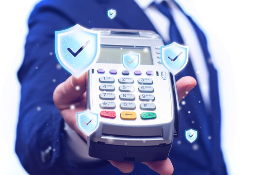 Secure contactless payment terminal held by a businessman with digital shield icons. Payment security, fraud protection, encrypted transactions, fintech, banking, cybersecurity and secure payment.