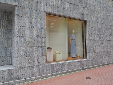 TOKYO, JAPAN - June 30, 2026: Display in the window of a Jil Sander store in Ginza.