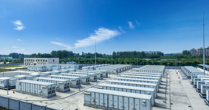 Large-Scale Outdoor Battery Energy Storage Facility Under Bright Blue Sky