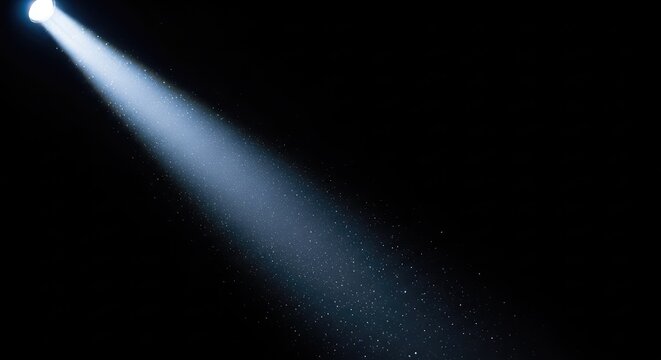 A dramatic single bright spotlight beam shines through a dark empty space, illuminating tiny floating dust particles in the sharp rays, design, texture, void