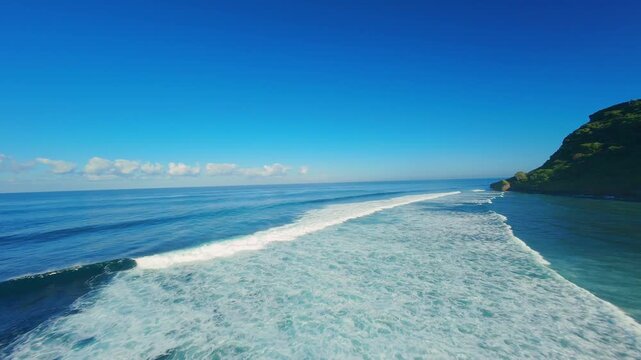 FPV Drone Following Breaking Ocean Waves at Nyang Nyang Beach, Fast Low Flight Above Whitewater And Deep Blue Sea, Surf Adventure And Coastal Motion