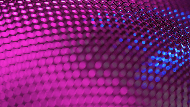 Blurred bokeh abstract spherical grid illuminated with bright pink and blue light creates a modern composition for websites, presentations, graphic design projects.