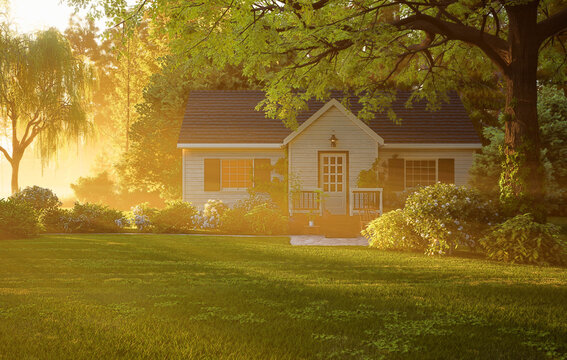 Cozy suburban house in warm morning sunlight