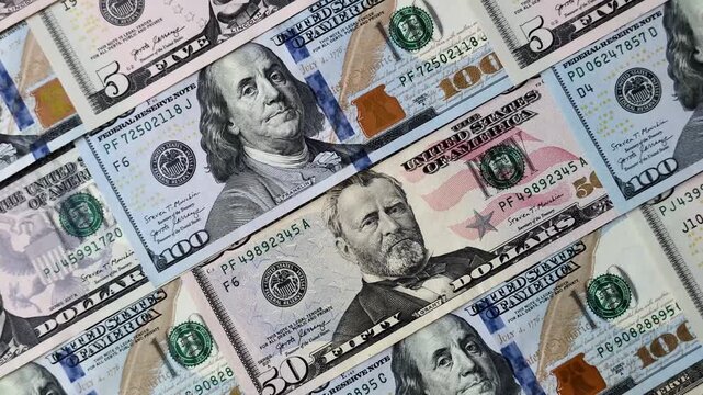 Paper US dollar bills of various denominations and cent coins as a business tool for exchange and trade. Cash US dollars as a background for your design