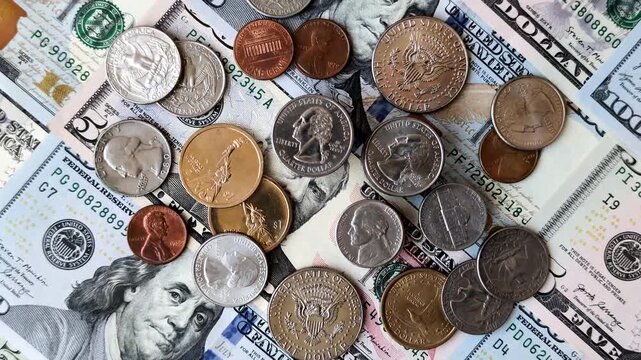 Paper US dollar bills of various denominations and cent coins as a business tool for exchange and trade. Cash US dollars as a background for your design