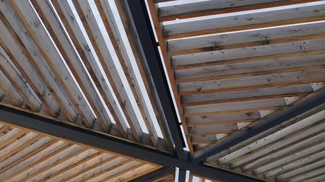 Wooden structure ceiling design, modern, minimalistic, with metal framework, copy space
