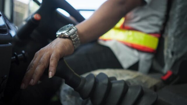 Hand Shifting Gear Lever Inside Truck Cabin Close Up