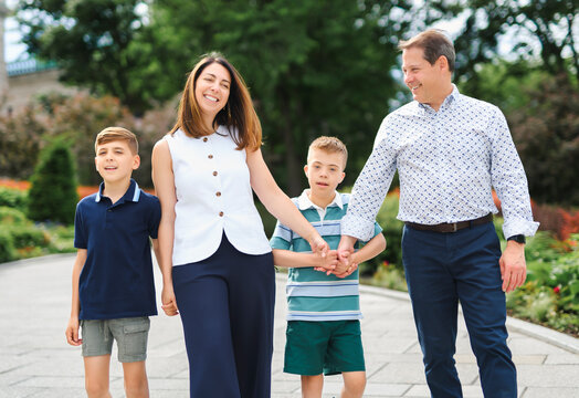 family having great time in city walking together