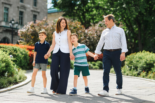 family having great time in city walking together