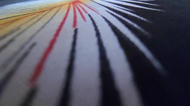 Macro close-up of a textured fabric with parallel mustard yellow, black, and white striped pattern and a bold central red line, high-quality textile background, abstract artistic woven material detail