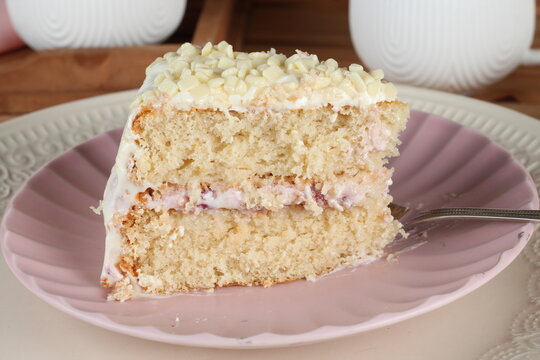 Slice of strawberry cake served on a plate