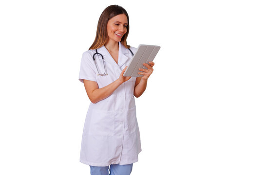Female doctor standing, wearing a stethoscope and white lab coat, using a digital tablet for healthcare technology