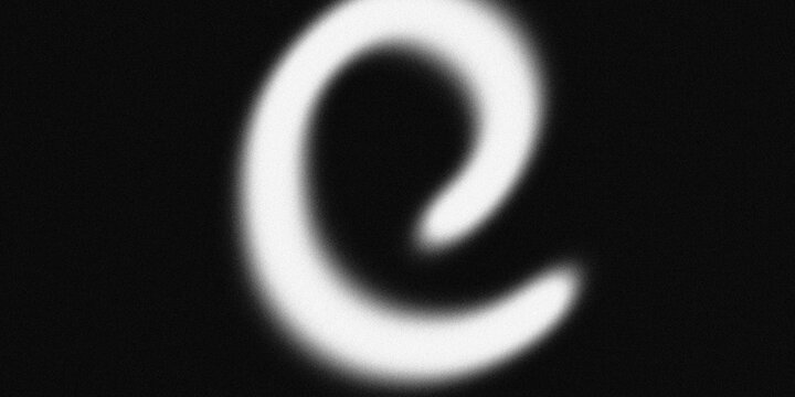 Lower case letter e in white spray paint on solid black background with soft focus blur and cinematic film grain texture detail