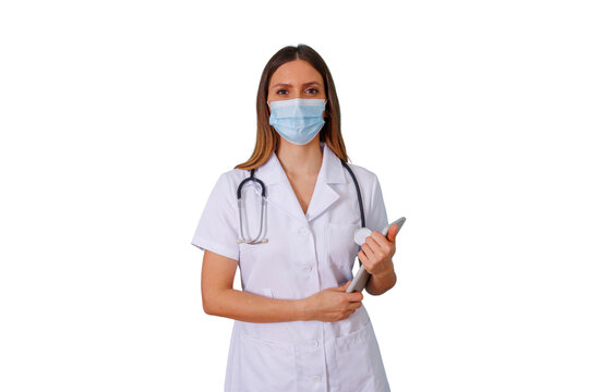 Female doctor wearing face mask and stethoscope, holding digital tablet on transparent background, healthcare professional