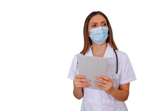 Female doctor or nurse in medical mask and uniform holding a digital tablet, working in healthcare, transparent background