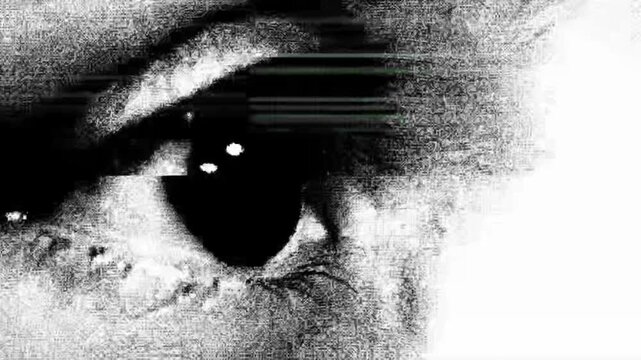 Extreme close up of human eye blinking with vibrant red flash effect in cinematic high contrast monochrome film footage.