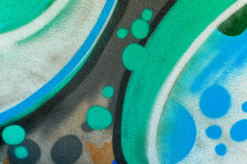 beautiful wallpaper of street wall graffiti painting of aerosol urban art. Colorful city background of spray graffiti drawing in modern culture style © Yaroslav