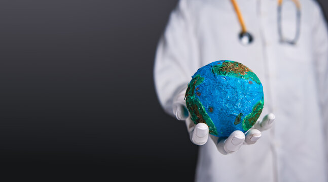 Robot doctor hand holding earth globe for global health concept.