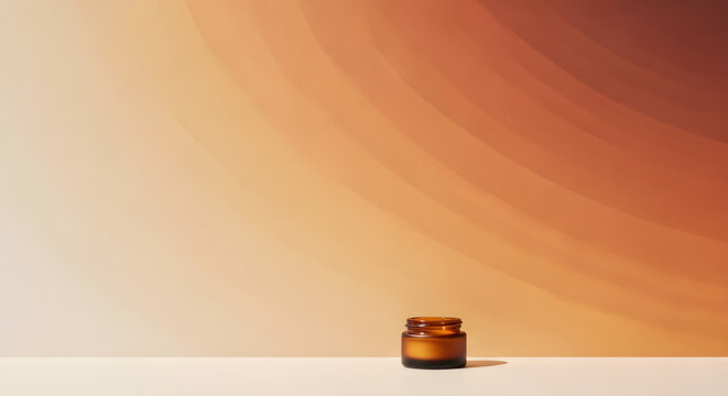 Empty amber glass jar with sunlight shadow on podium