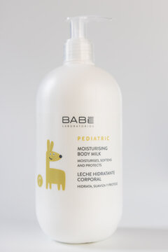 Laboratorios BABE Pediatric Moisturising Body Milk white plastic pump bottle on light background