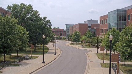 Fototapeta premium campus road with directional signs and buildings