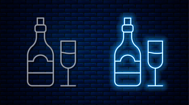 Glowing neon line Champagne bottle with glass icon isolated on brick wall background. Vector