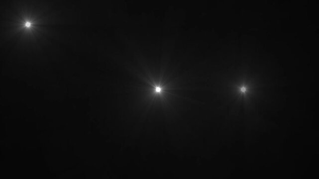 Paparazzi camera flashes, blinking flashlights animation on black background.Random bright blinking lights, Photography Flash.camera burst flash lights overlay paparazzi effect loop.